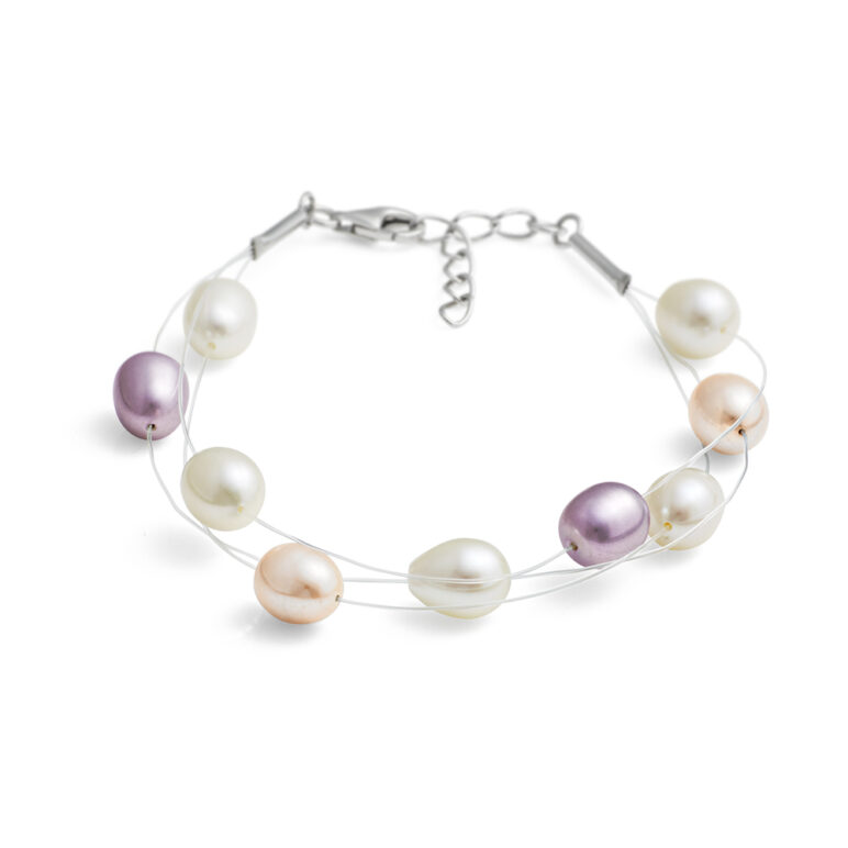 Multi Natural Oval Freshwater Pearl Bracelet on a Triple Row Clear Nylon Thread.