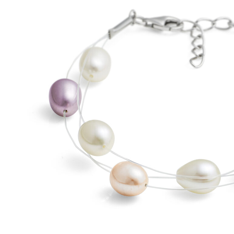 Multi Natural Oval Freshwater Pearl bracelet on triple Row Nylon Thread with Sterling Silver