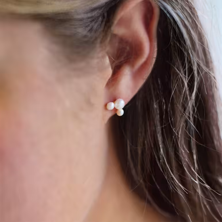 3-5mm Freshwater button pearls set on yellow gold-plated Sterling Silver stud earrings