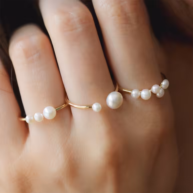 Freshwater button and Keshi pearls set on yellow gold-plated Sterling Silver rings