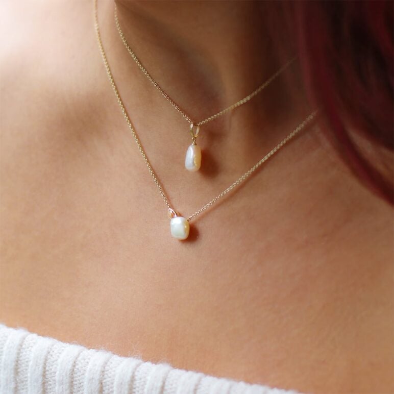 8mm white Keshi freshwater pearl 9ct yellow gold pendant paired with 8mm white Keshi freshwater pearl white topaz 9ct yellow gold necklace