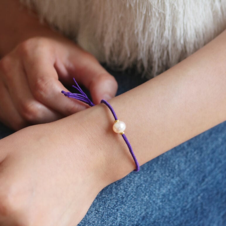 8mm freshwater pearl adjustable tassel bracelet on recycled plastic coloured thread