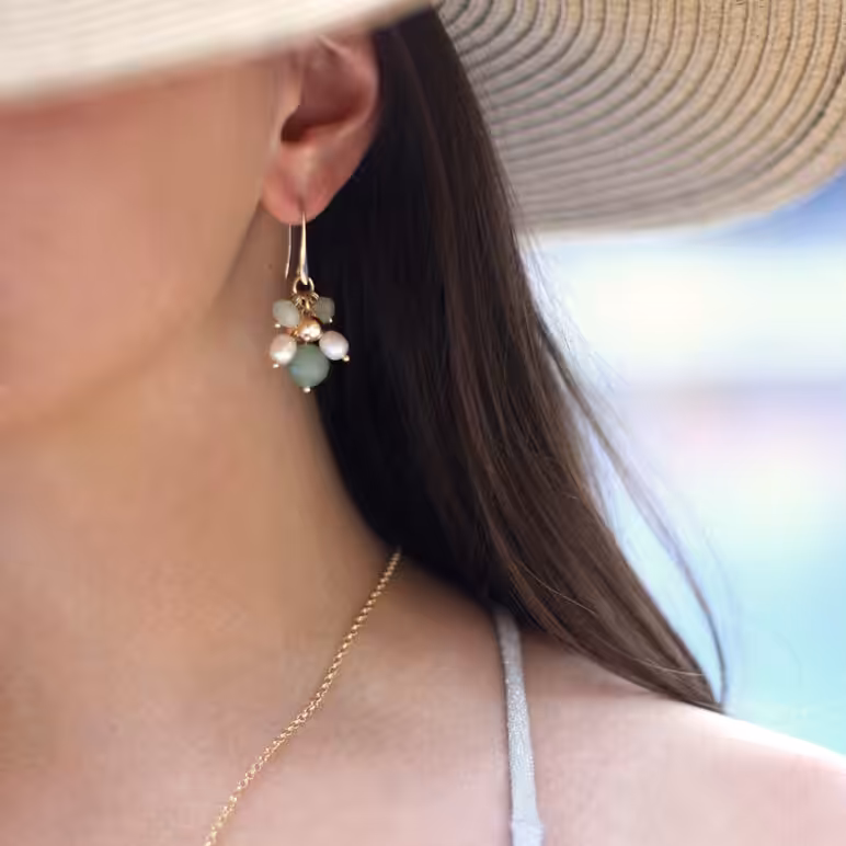 Model wearing Joy pearl earrings aventurine