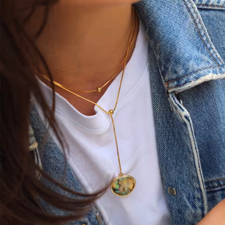Woman wearing Jersey Pearl Paua Disc Double Necklace Yellow Gold Plated Brass Mother of Pearl Pendant