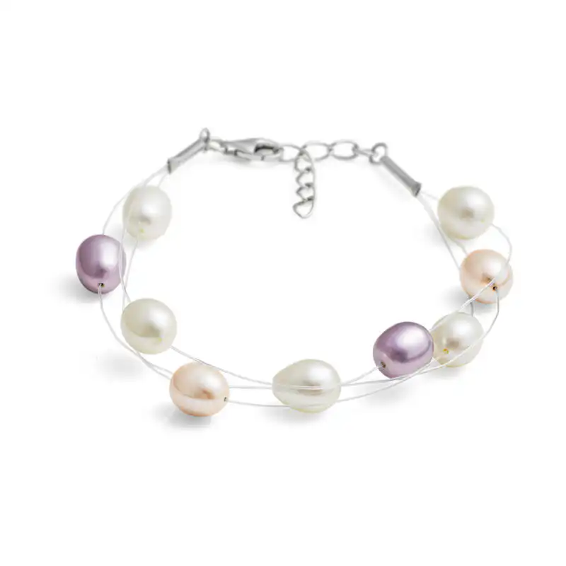 Multi Natural Oval Freshwater Pearl Bracelet on a Triple Row Clear Nylon Thread.