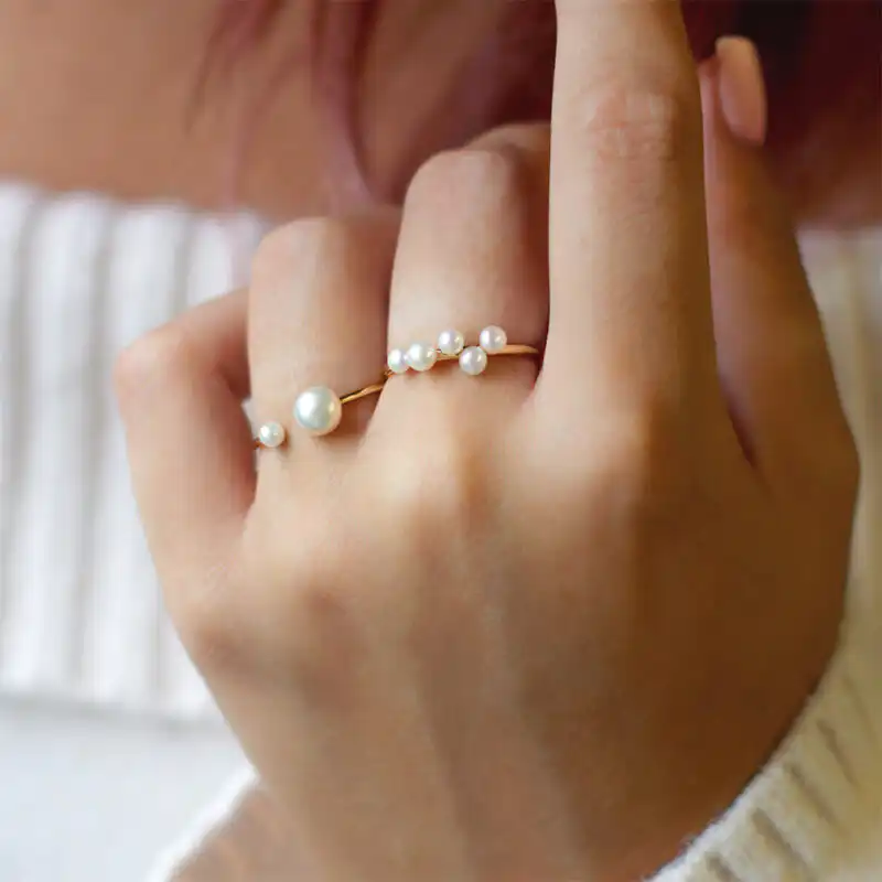 Freshwater button and Keshi pearls set on yellow gold-plated Sterling Silver rings