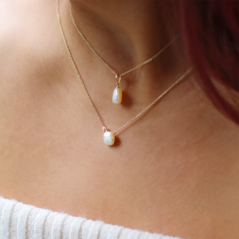 8mm white Keshi freshwater pearl 9ct yellow gold pendant paired with 8mm white Keshi freshwater pearl white topaz 9ct yellow gold necklace