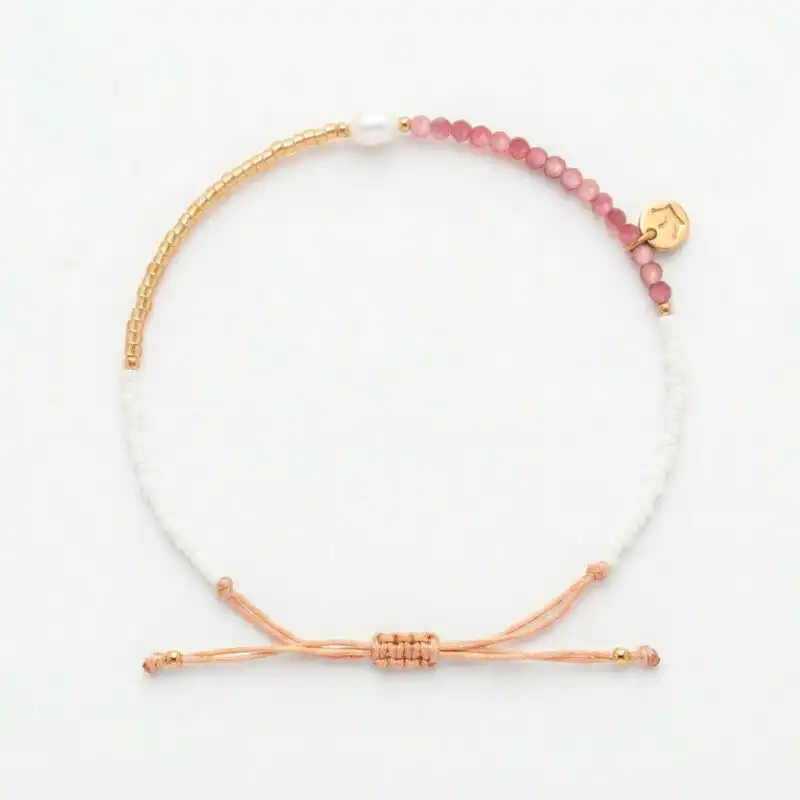 white 4mm oval freshwater pearl Rhodocrosite stone drawstring bracelet with white and yellow gold coloured beads