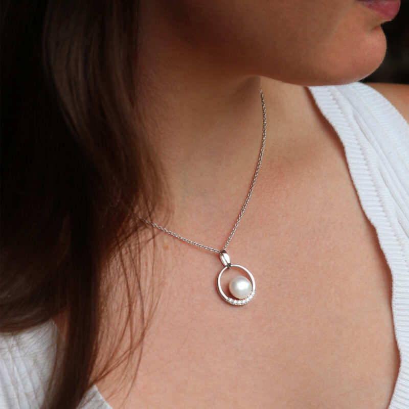 Jersey Pearl Circle Freshwater Pearl Pendant set with White Topaz on Sterling Silver