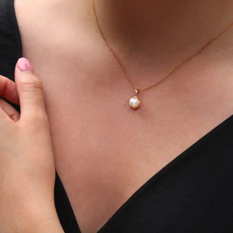 Model wearing Jersey Pearl Akoya Flower Pendant 9ct Yellow Gold