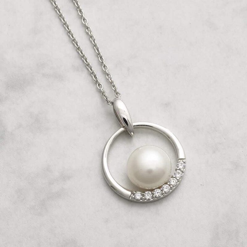 Jersey Pearl Freshwater Pearl Pendant set with White Topaz on Sterling Silver