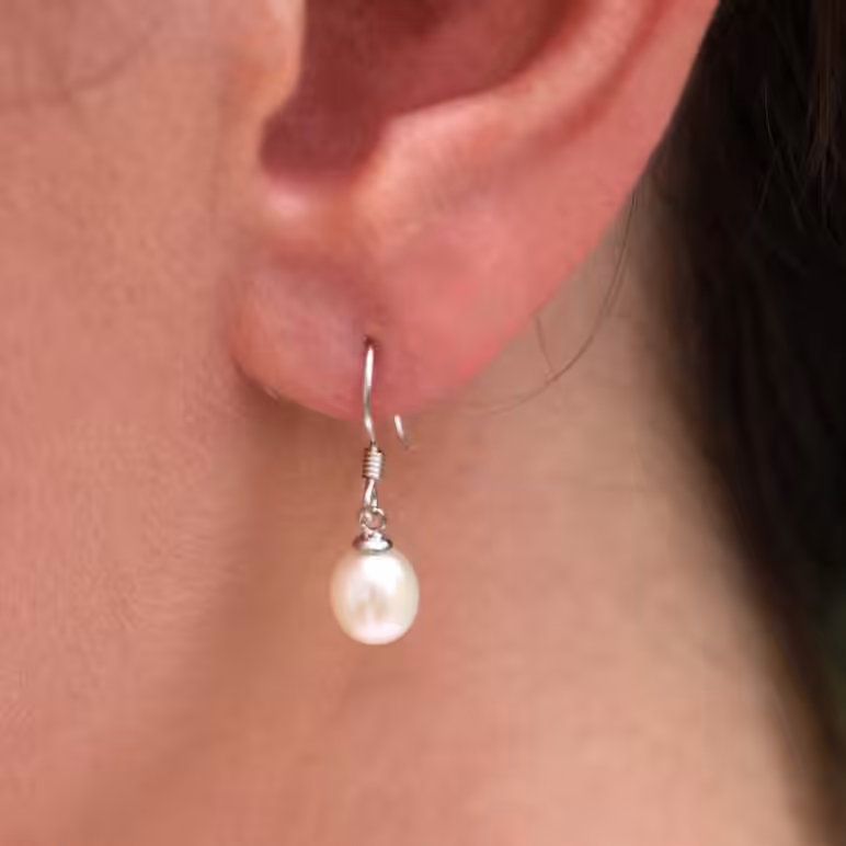 Model Wearing Jersey Pearl Classic Freshwater White Pearl Sterling Silver Hook Earrings
