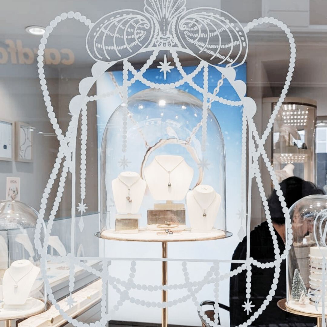 Photo of King Street shop window with christmas art