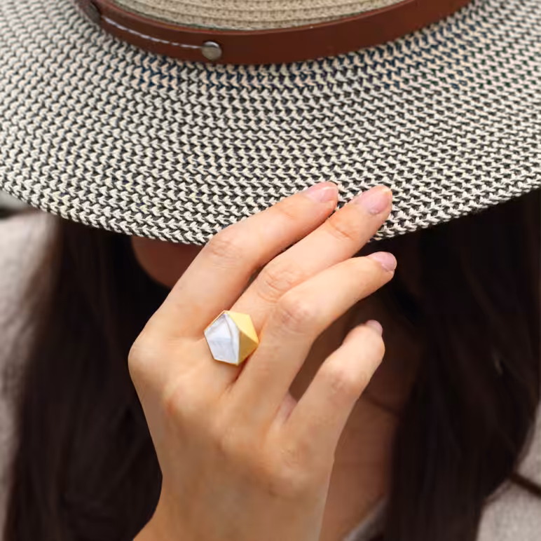 Lifestyle model wearing Kyra gold adjustable ring