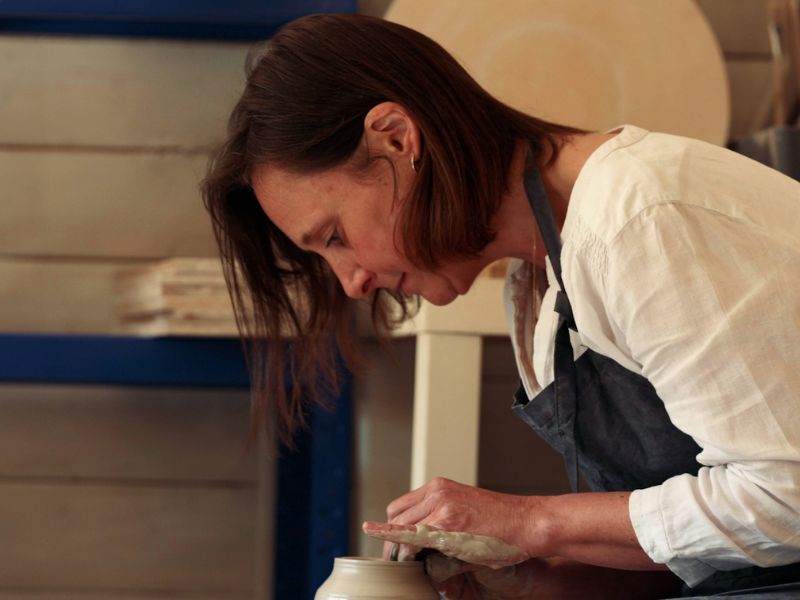Nicky from Penguin Potters in her pottery shed