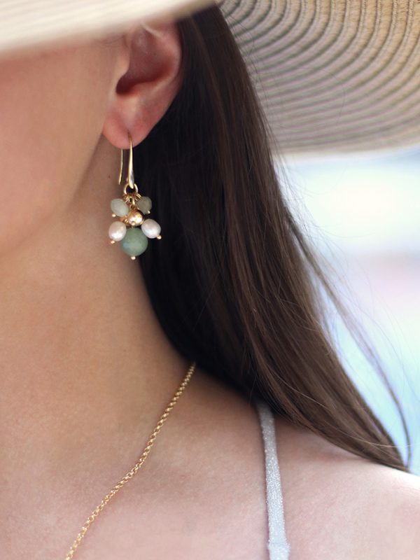 Model wearing Joy pearl earrings aventurine