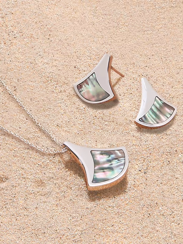 Ormer Pendant and Earrings in the sand