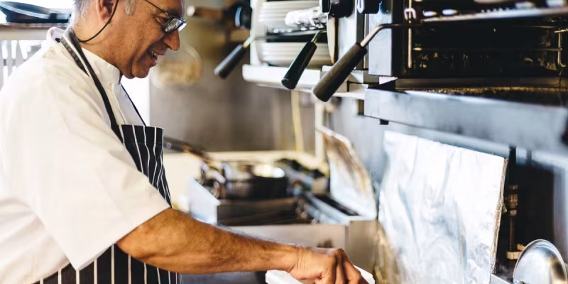 Chef preparing food at the Jersey Pearl cafe