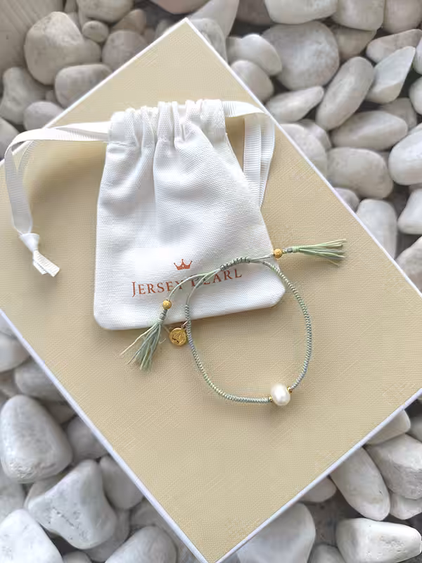 6mm white freshwater pearl colourful eco thread charity bracelet