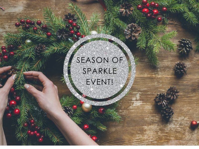 hands making a christmas wreath