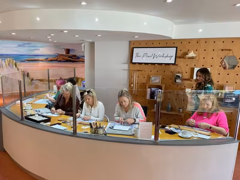 ladies learn how to professionally pearl string at jersey pearl st ouen
